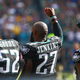 Linebacker Najee Goode, No. 52 of the Philadelphia Eagles, and teammates strong safety Malcolm Jenkins, No. 27, and cornerback Ron Brooks, No. 33, are shown during the national anthem before taking on the Minnesota Vikings at Lincoln Financial Field in Philadelphia on Oct. 23, 2016. (Mitchell Leff/Getty Images)